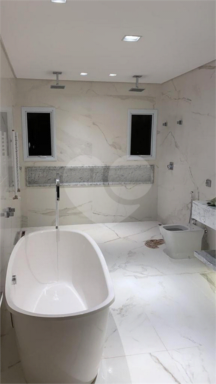 Casa em condomínio com 6 suítes em Campos do Jordão 