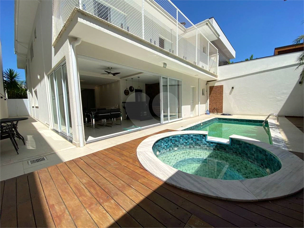 Casa de Condomínio à venda com 4 quartos, 335m² - Foto 1