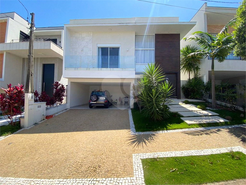 Casa de Condomínio à venda com 4 quartos, 335m² - Foto 2