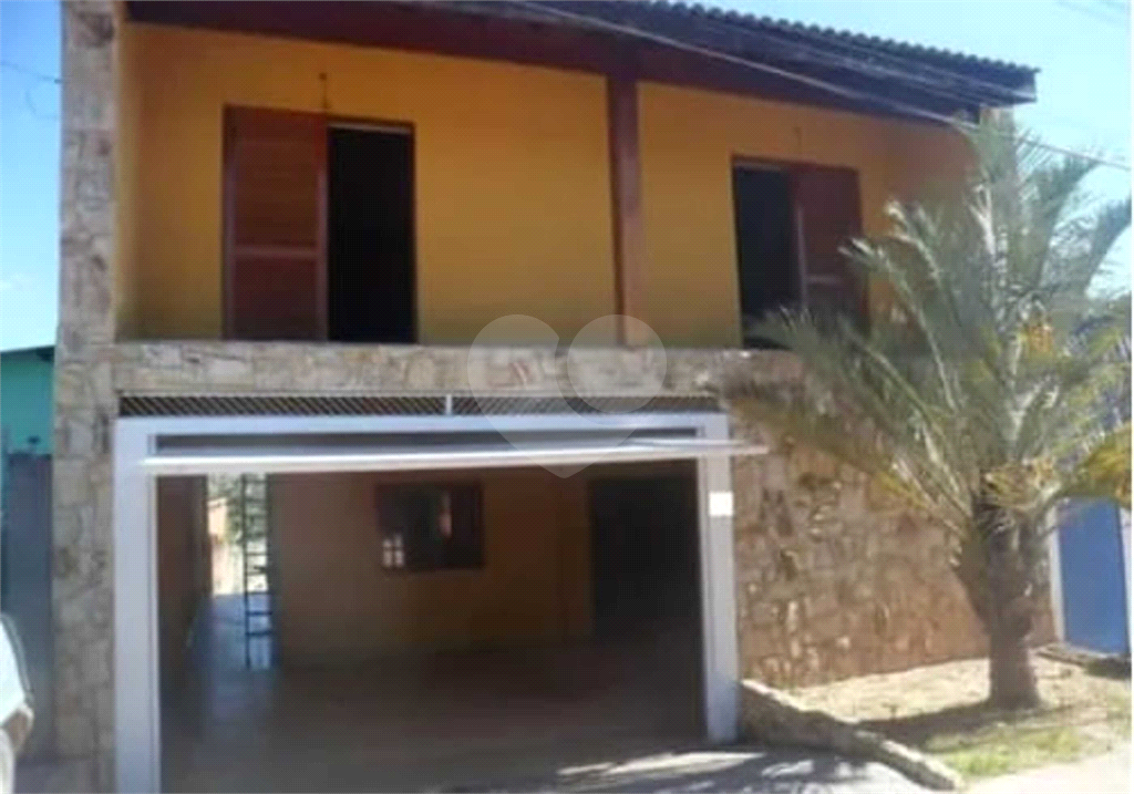 Casa à venda com 2 quartos, 107m² - Foto 1
