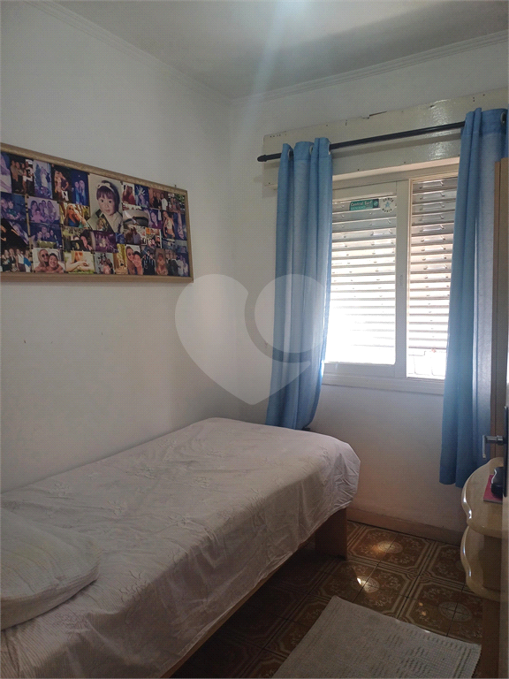 Casa com 4 dormitórios na Vila Aurora.