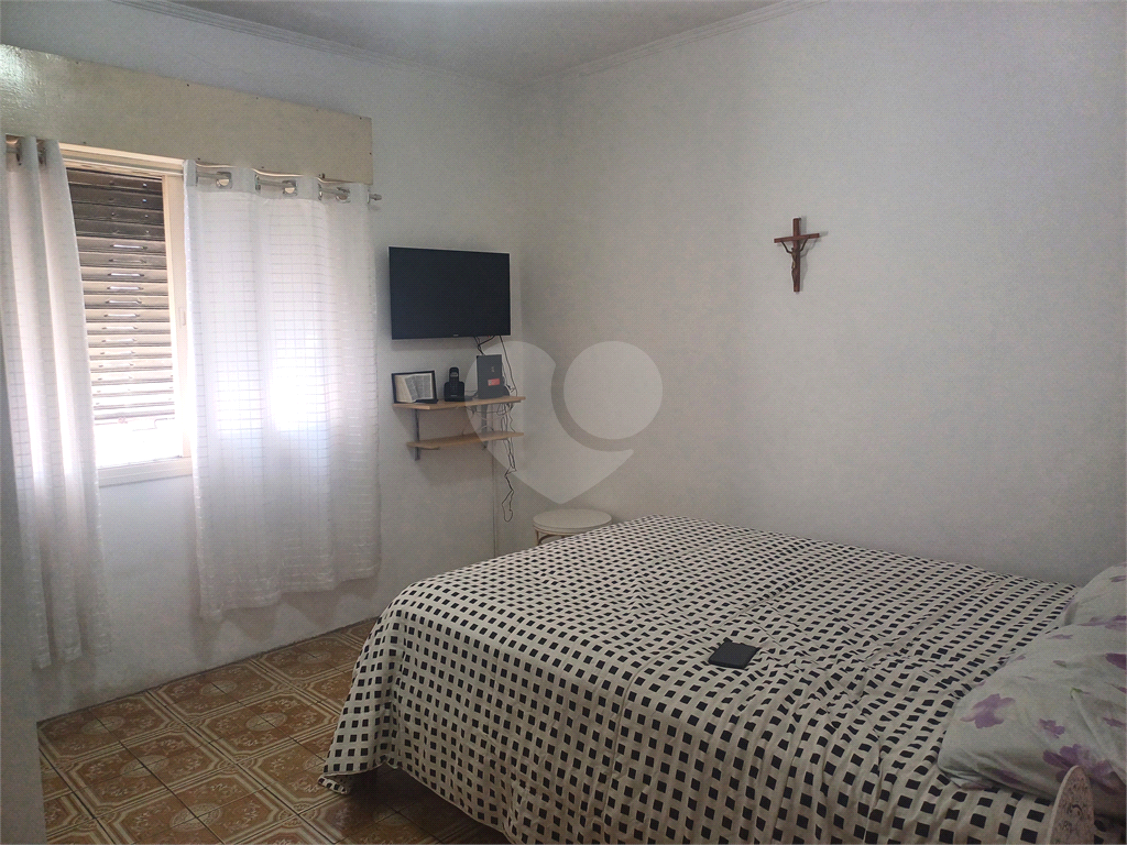 Casa com 4 dormitórios na Vila Aurora.