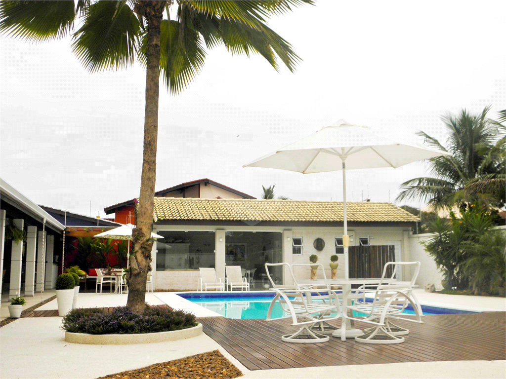 Casa à Venda Alto Padrão em Itanhaém, 4 suítes, closet, piscina, sauna, ateliê, varanda gourmet