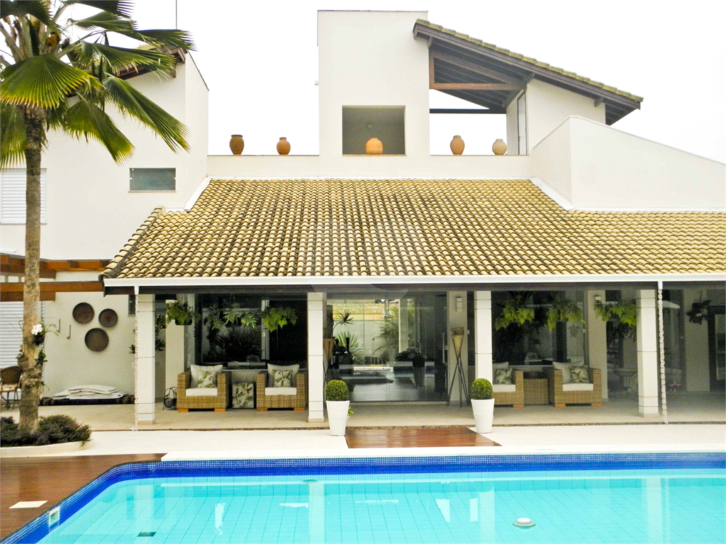 Casa à Venda Alto Padrão em Itanhaém, 4 suítes, closet, piscina, sauna, ateliê, varanda gourmet