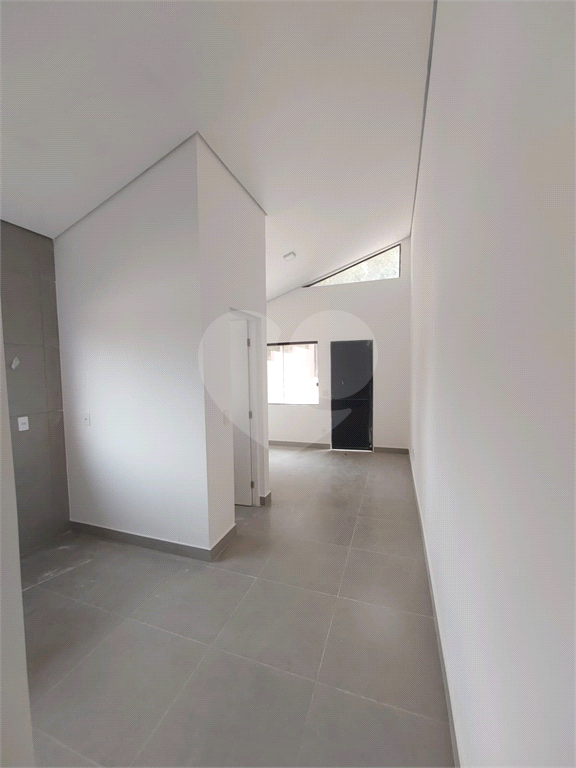 Casa à venda com 3 quartos, 70m² - Foto 11