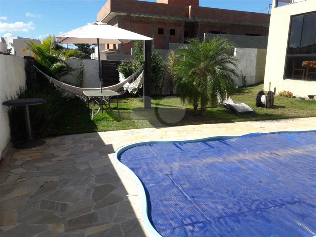 Casa de Condomínio à venda com 4 quartos, 220m² - Foto 1