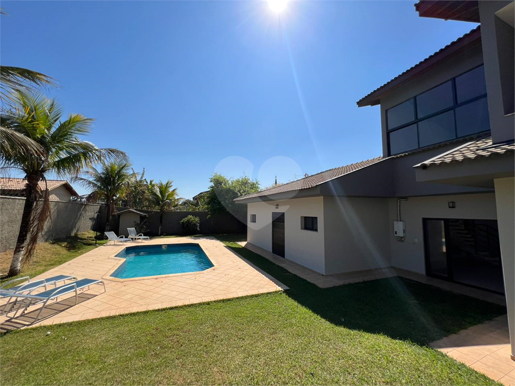 Casa de Condomínio à venda com 4 quartos, 400m² - Foto 3