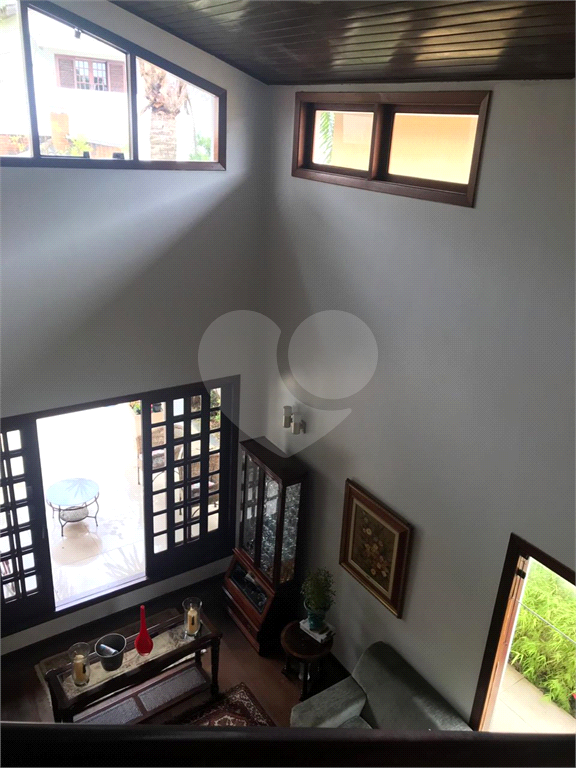 Casa em condomínio à venda em Alphaville com 4 suítes e 4 vagas
