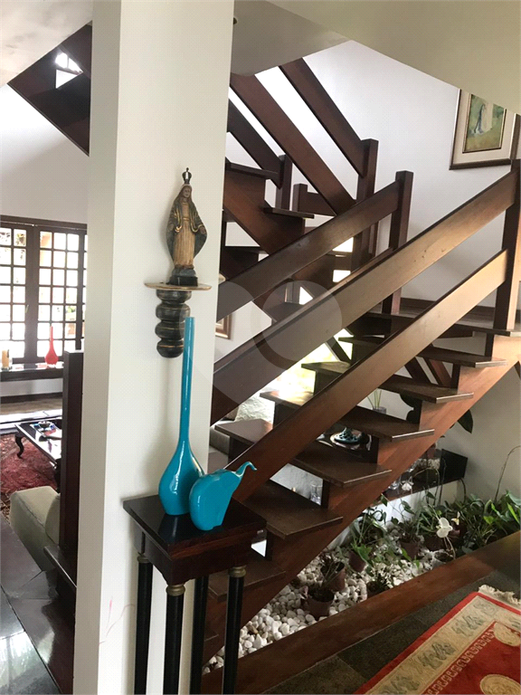 Casa em condomínio à venda em Alphaville com 4 suítes e 4 vagas