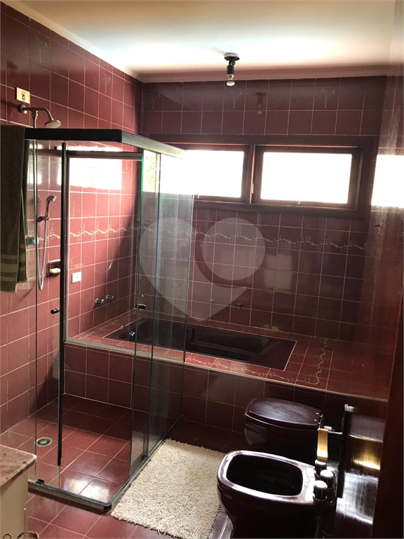 Casa em condomínio à venda em Alphaville com 4 suítes e 4 vagas