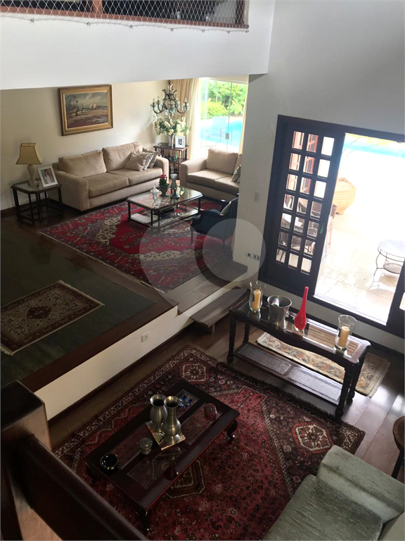 Casa em condomínio à venda em Alphaville com 4 suítes e 4 vagas