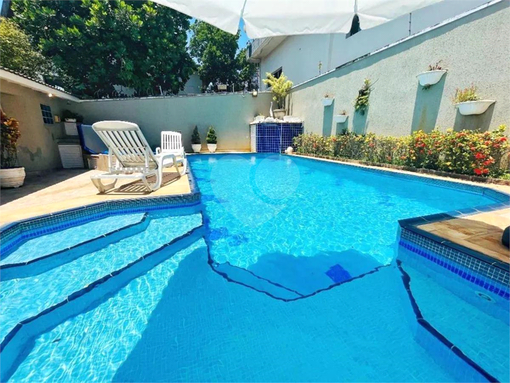 CASA EM FRENTE AO MAR COM 420M2 - ENSEADA - GUARUJÁ 