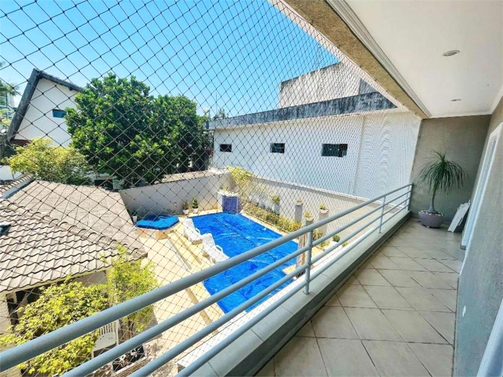 CASA EM FRENTE AO MAR COM 420M2 - ENSEADA - GUARUJÁ 