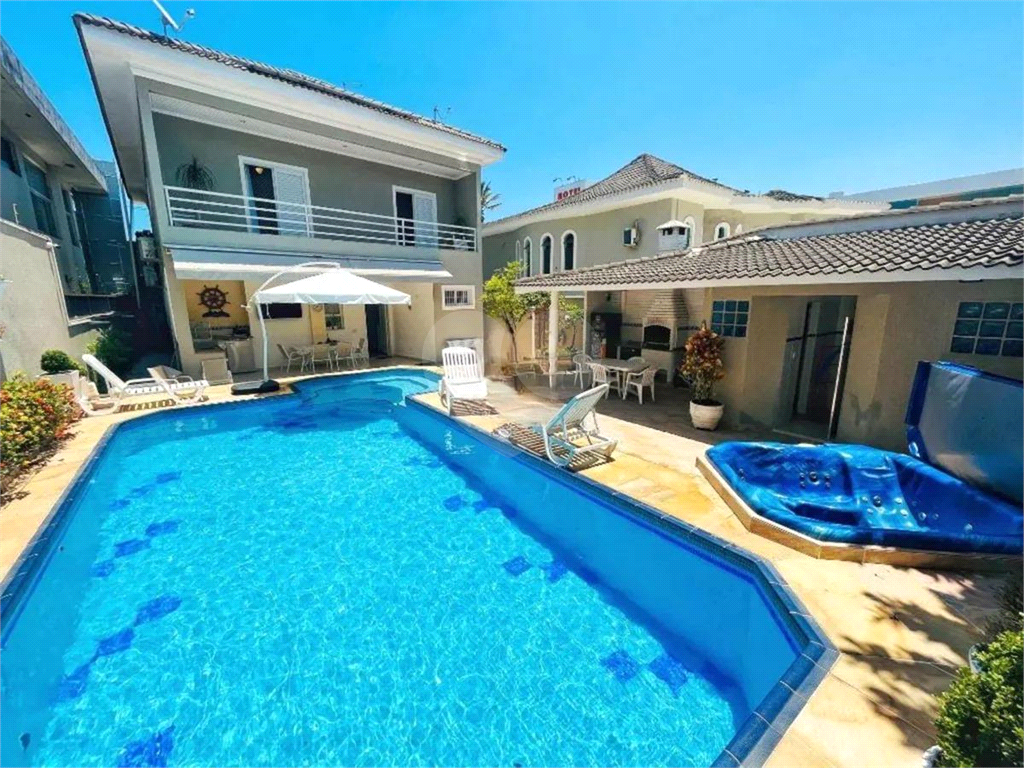CASA EM FRENTE AO MAR COM 420M2 - ENSEADA - GUARUJÁ 