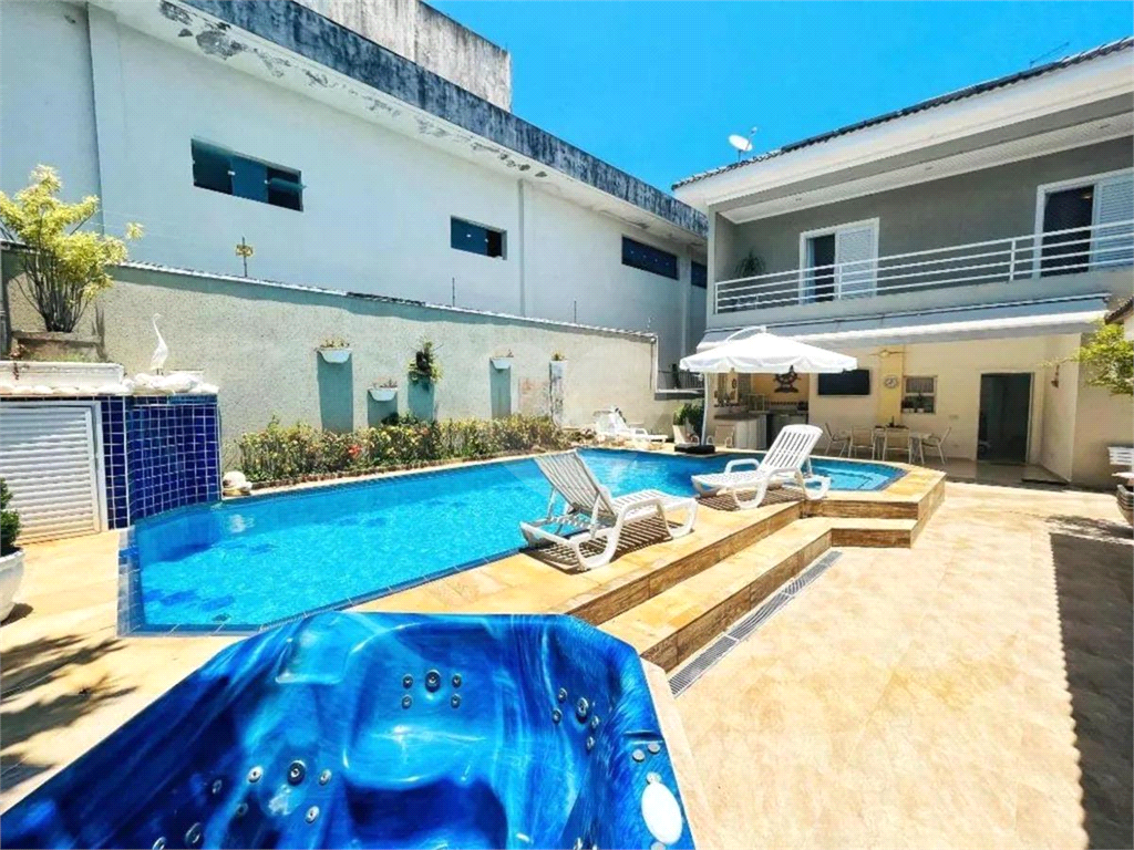 CASA EM FRENTE AO MAR COM 420M2 - ENSEADA - GUARUJÁ 