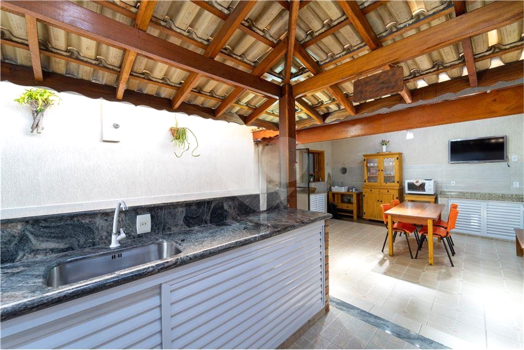Casa à venda com 4 quartos, 328m² - Foto 18