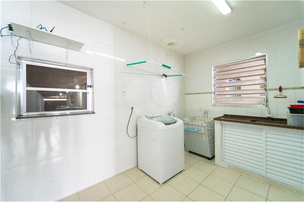 Casa à venda com 4 quartos, 328m² - Foto 33