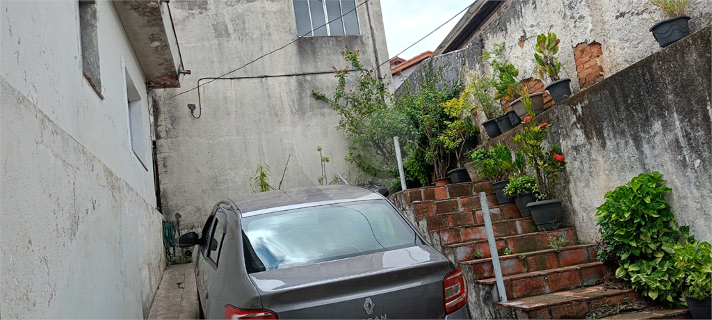 Imóvel para Investidor, Terreno com 382 m2, com 02 casas em rua tranquila
