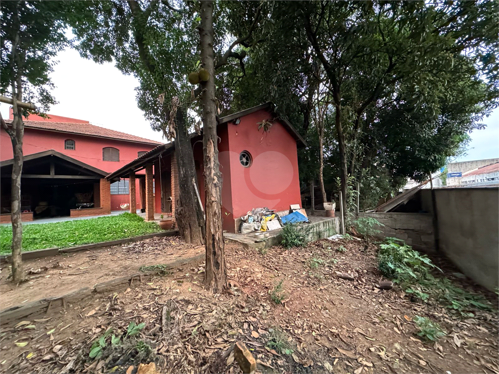 Terreno com casa