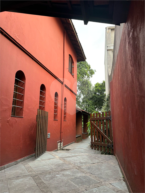 Terreno com casa