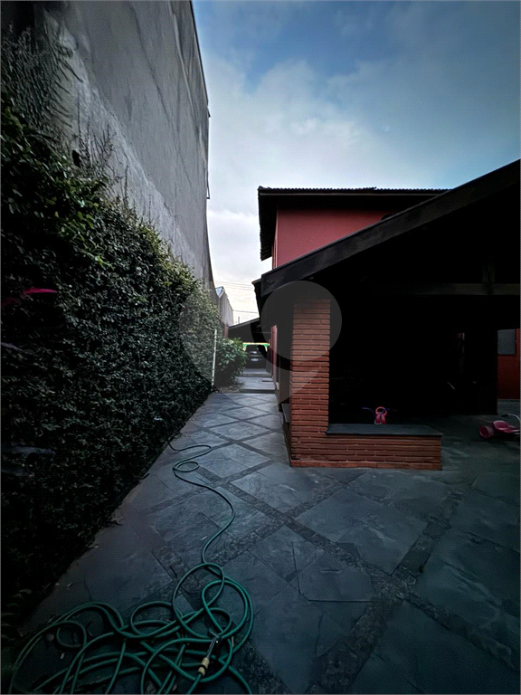 Terreno com casa
