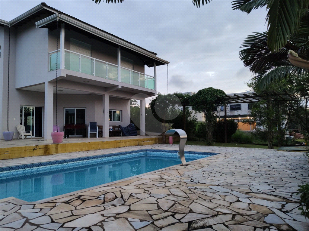 Casa de Condomínio à venda com 4 quartos, 345m² - Foto 1