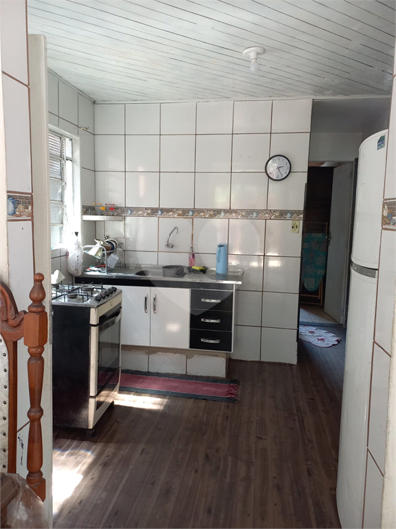 Casa à venda com 3 quartos, 100m² - Foto 4