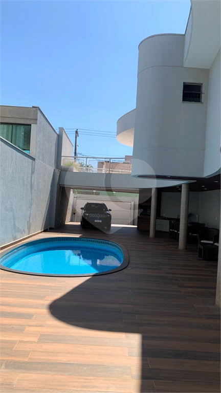 Casa à venda com 4 quartos, 315m² - Foto 25