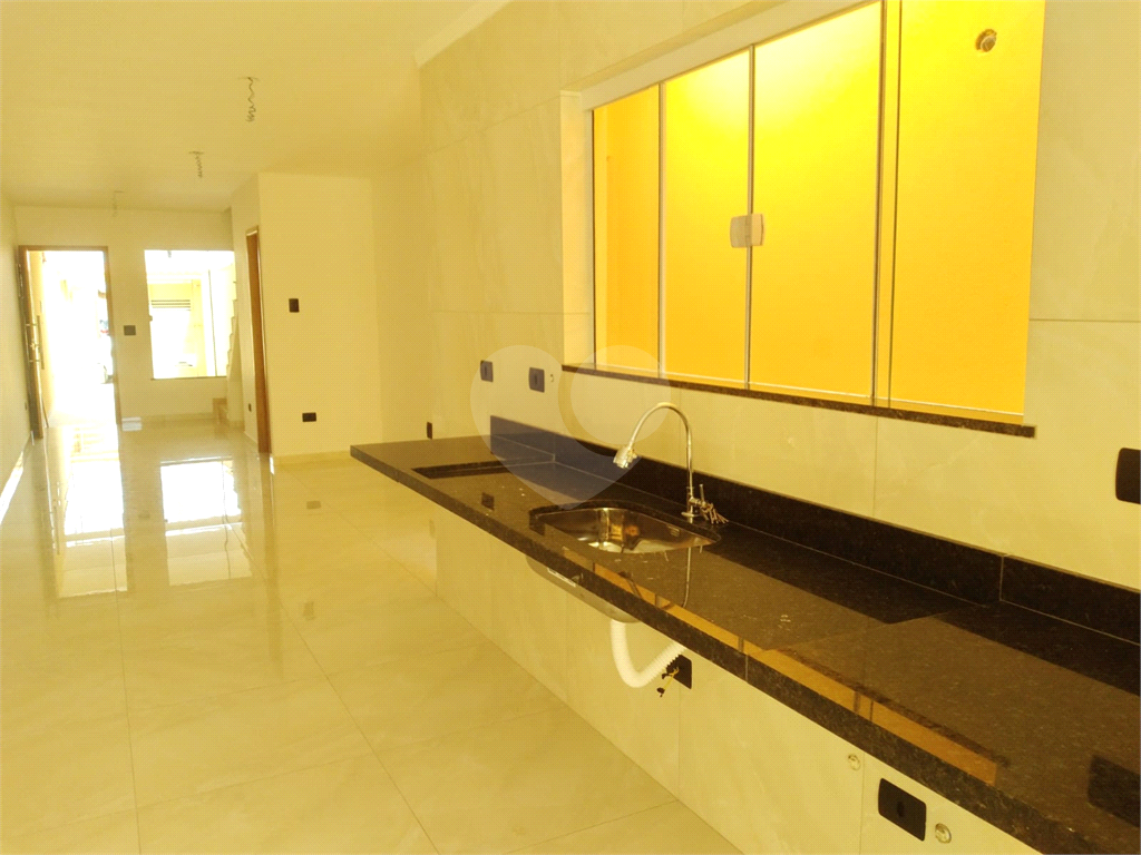  Sobrado com 200m2 de área construída com 3 suítes, 4 banheiros,  quintal gourmet e 2 vagas