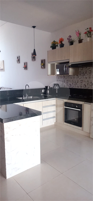 Casa à venda com 3 quartos, 100m² - Foto 1