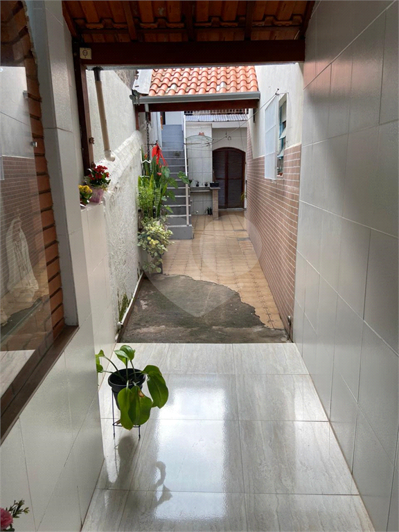 Casa à venda em Santo André, na Vila Suíça, 2 dormitórios (1 suíte), 2 vagas, quintal, churrasqueira