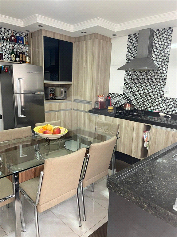 Casa à venda em Santo André, na Vila Suíça, 2 dormitórios (1 suíte), 2 vagas, quintal, churrasqueira