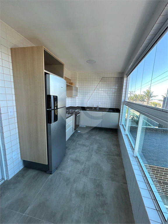 Apartamento na Praia Grande frente praia com Varanda Gourmet