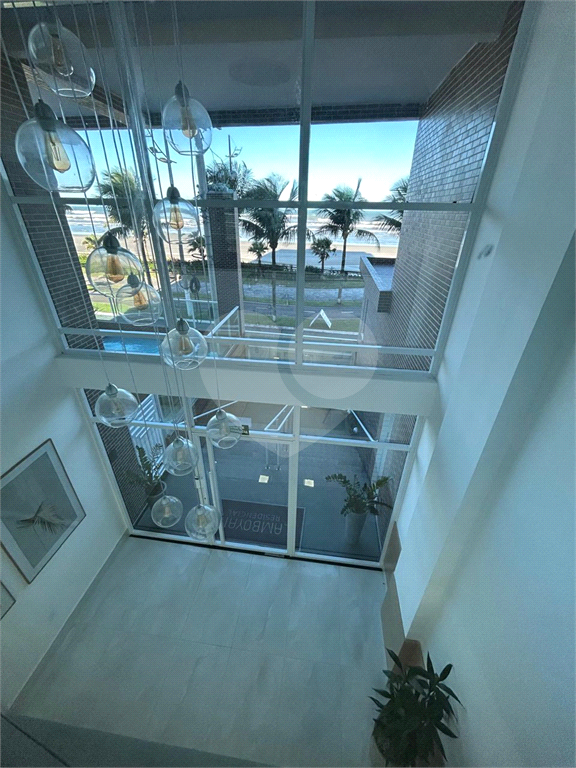 Apartamento na Praia Grande frente praia com Varanda Gourmet