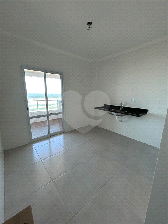 Apartamento na Praia Grande frente praia com Varanda Gourmet