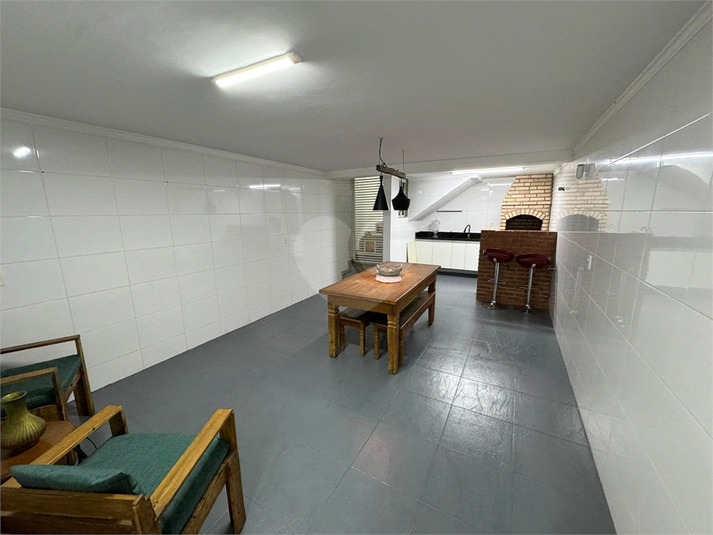 Churrasqueira/garagem