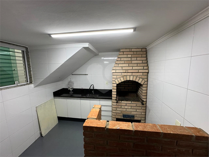 Churrasqueira/garagem