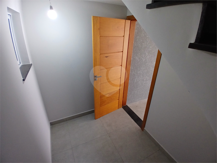 entrada do imóvel pela garagem