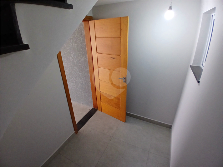 entrada do imóvel pela garagem