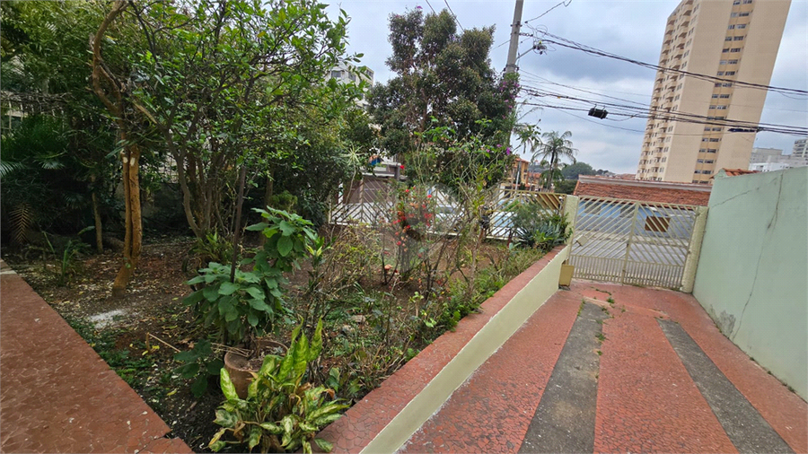 ACESSO A GARAGEM E JARDIM 