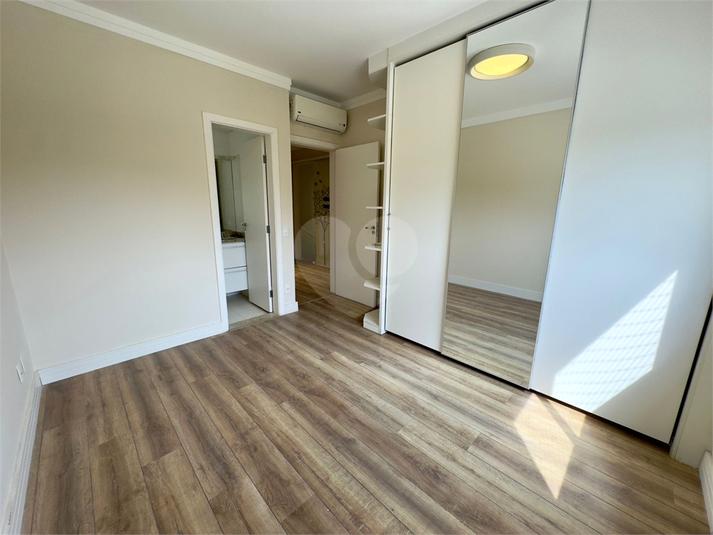 Dormitório 4 (suíte) com armário planejado e ar-condicionado
