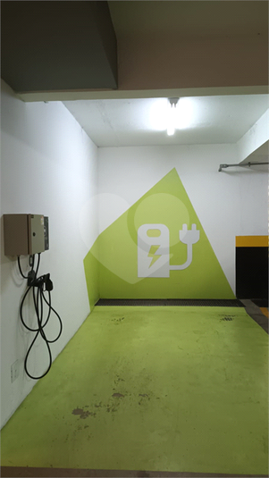Carregador de veículo elétrico