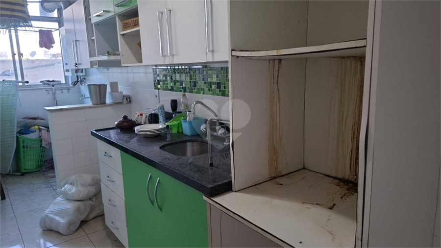 Cozinha planejada mais área de serviço com tanque e aquecedor