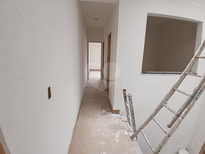 corredor interno para acesso aos dormitórios