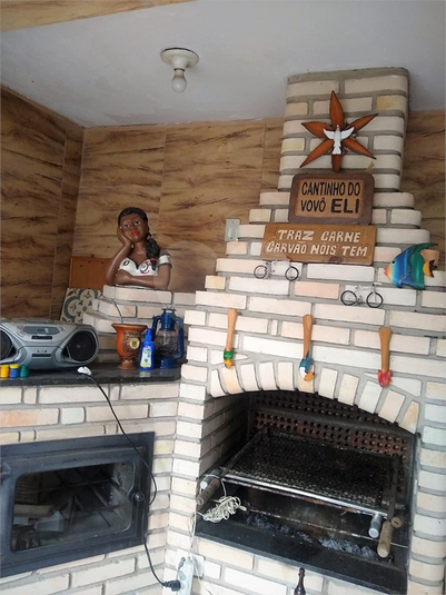 churrasqueira, forno de pizza e fogão a lenha