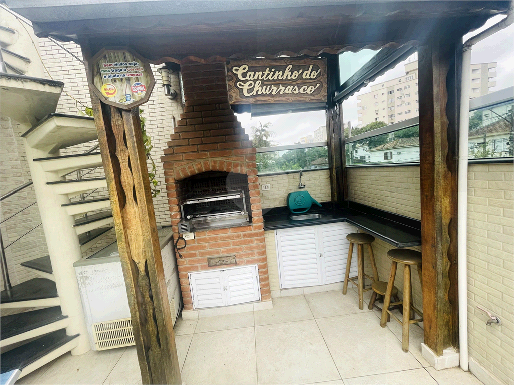 Venda Casa Santos Embaré REO709130 20